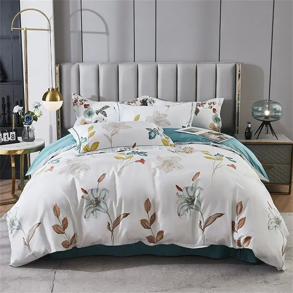 White duvet cover with delicate teal brown and muted green lily motifs on smooth fabric from decorbites 600tc egyptian cotton bedding set