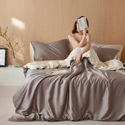 A luxurious taupe satin 60s rayon silk bedding set with smooth glossy finish and elegant draping for summer cooling