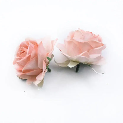 Two delicate peach-colored artificial flowers with layered petals and green stems in 6cm roses head for home decor