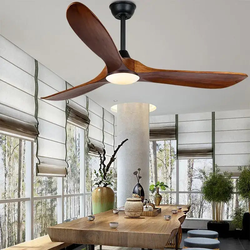 A sleek DecorBites™ 70 ceiling fan with remote control, three wide dark brown wooden blades, and a black central hub