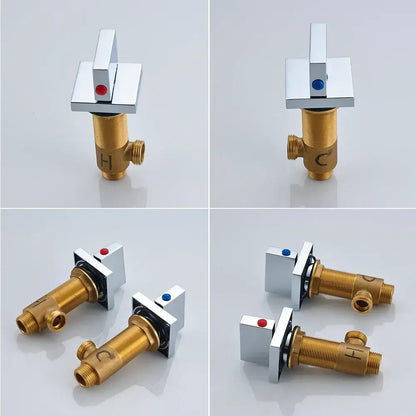 Modern chrome faucet handles with brass bodies and indicator dots for hot cold water on a black bronze wall mounted basin mixer tap