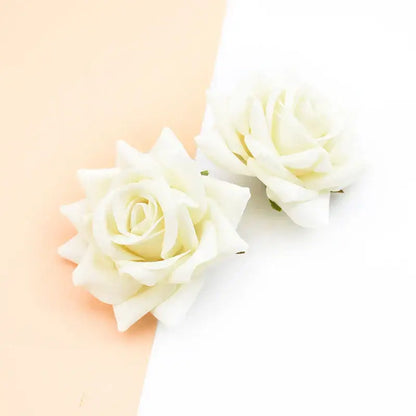 Two artificial white fabric rose heads with layered petals and green stems decorbites 7cm rose for wedding décor