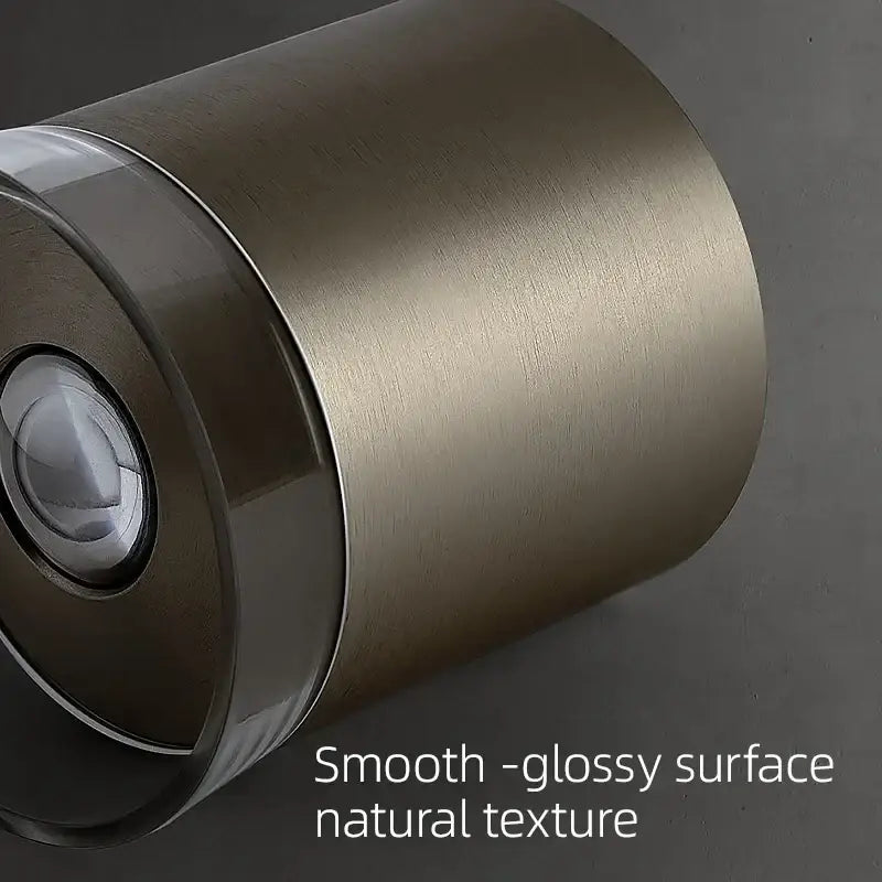 Brushed brass cylindrical wall-mounted spotlight with sleek glossy surface for decorbites 7w high cri living room lighting