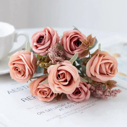 A delicate decorbites™ pink peony silk bouquet with soft pink artificial roses and green brown foliage accents for decoration