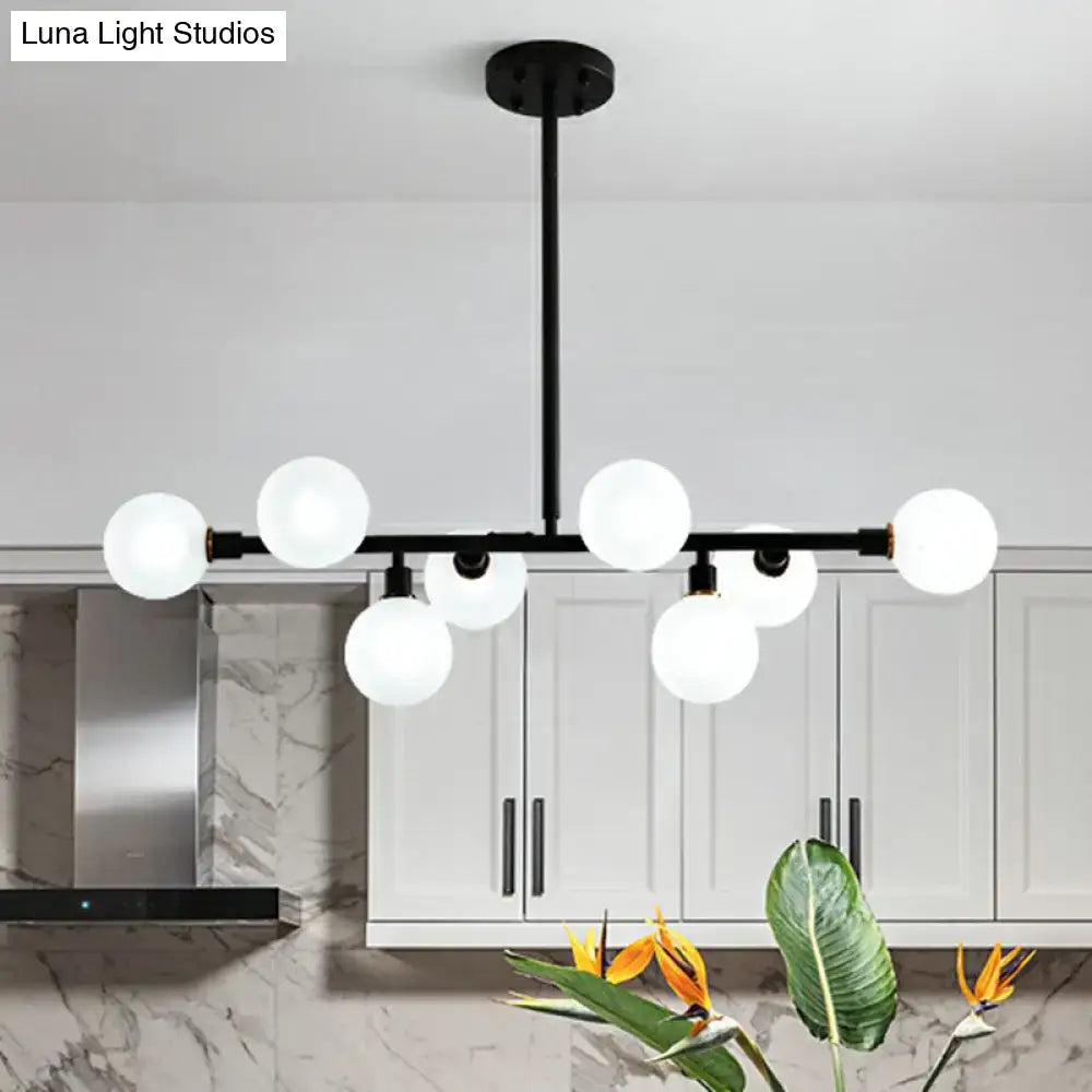 Modern black metal chandelier with frosted glass globe lights e26 e27 for restaurants by DecorBites™