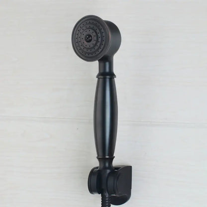Black matte handheld showerhead with circular spray face and ergonomic handle in DecorBites™ shower faucet set
