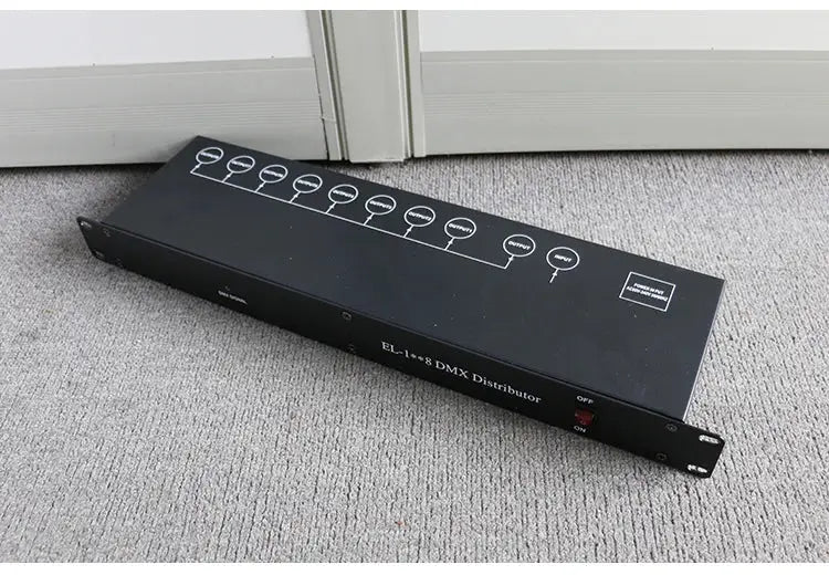 Black DecorBites™ el-1x8 dmx signal amplifier splitter with labeled ports and red power indicator for led lights distribution