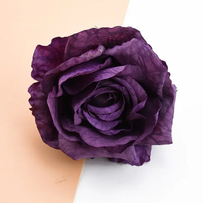 A deep purple 9cm silk rose with crinkled layered petals from decorbites™ artificial flowers for decor and gifts