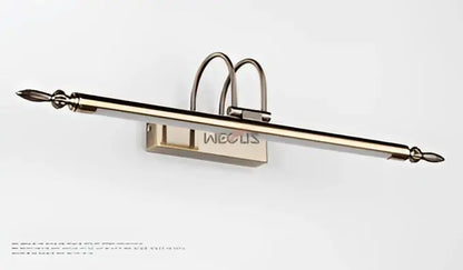 A sleek metallic wall-mounted coat rack with polished brass finish and curved design featured with decorbites 9w led mirror lights