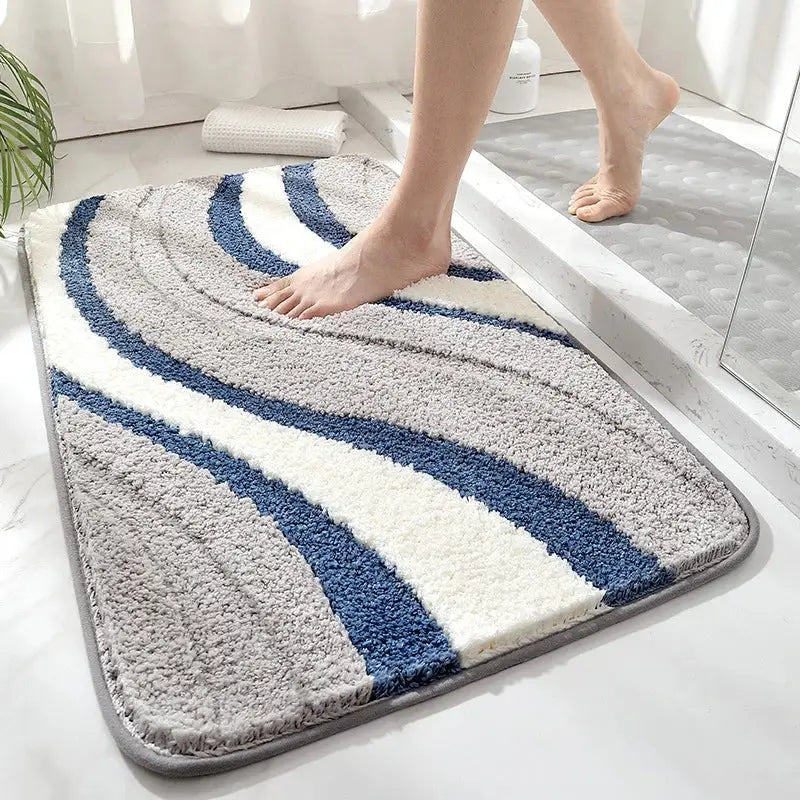 Decorbites absorbent water bathroom mat with soft plush fabric and wavy gray navy blue and white stripes design