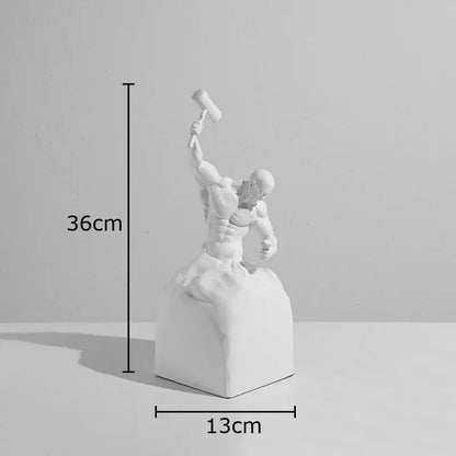 White resin character statue of a muscular figure wielding a hammer on a blocky base for abstract artworks desk decor