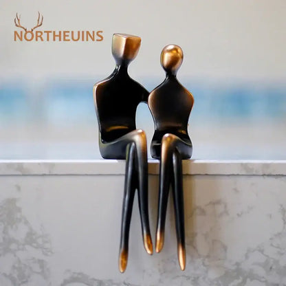 Bronze-finished resin decorbites abstract art lover statue featuring sleek minimalist design for Valentine’s anniversary gift