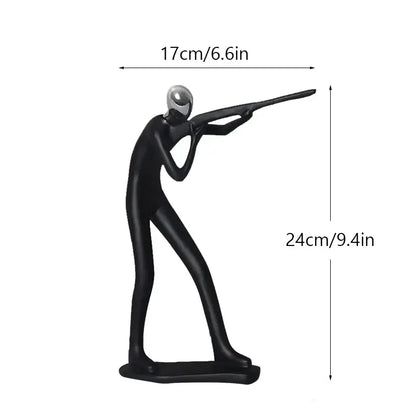 Black resin decorbites abstract athlete statue sculpture of a shooter with silver helmet and rifle standing 24cm tall