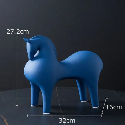 DecorBites abstract ceramic horse decorative figurine in sleek matte blue with white-painted feet and minimalist design