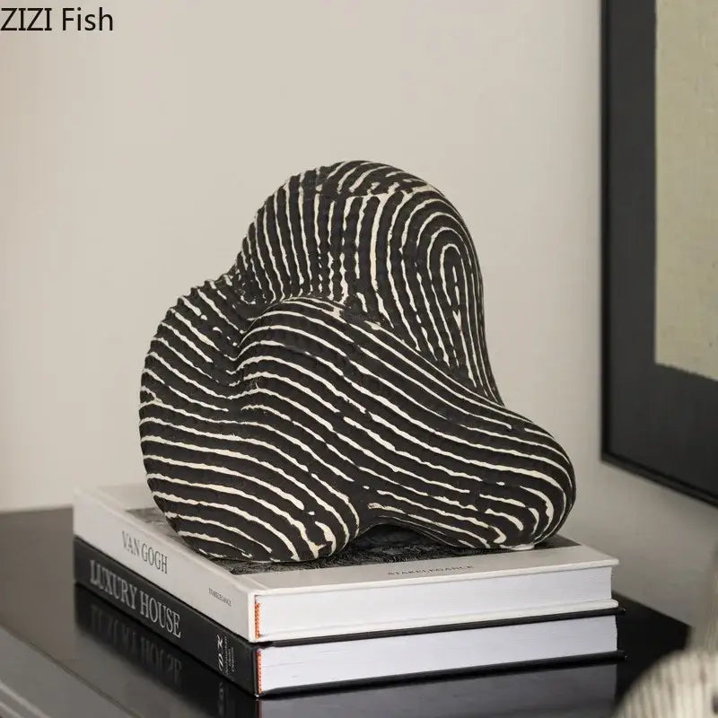 Decorbites abstract ceramic rockery sculpture ornament with black and white striped swirling design for desk decoration