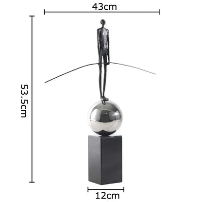 Decorbites™ abstract character marble sculpture featuring a slender figure on a silver sphere for marble sculpture room decor