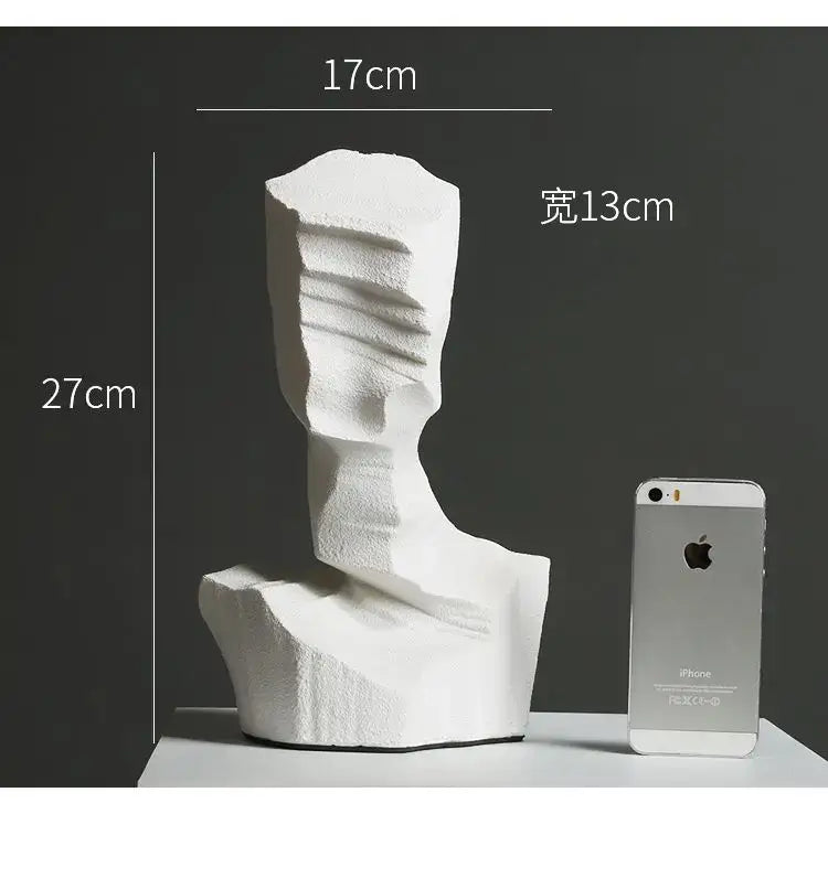 White abstract characters sculpture with textured layered surfaces decorbites abstract characters for modern decor
