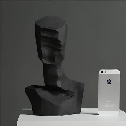 Black textured abstract characters sculpture bust with angular layered design from decorbites for modern decor