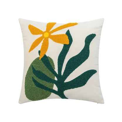 Cream-colored decorbites abstract embroidery cushion cover with orange-yellow flower and dark green leaves on soft velvet