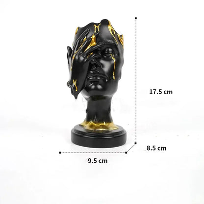 DecorBites abstract face mask black and gold resin sculpture with hand covering one eye for home decor display