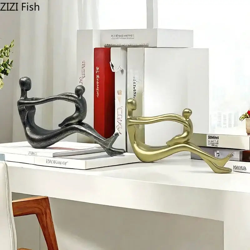 DecorBites abstract family resin sculpture with matte black and brushed gold bookends for desk decor and room aesthetic