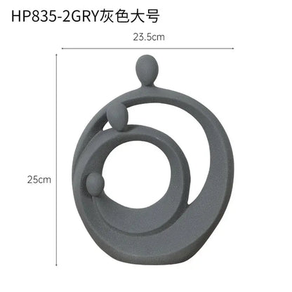 Gray abstract family sculpture set by decorbites featuring three interlocking circular forms with rounded elements