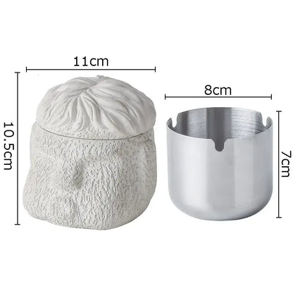 White textured ceramic portraits cement ashtray with lid and silver metallic cup from decorbites abstract figure portraits collection