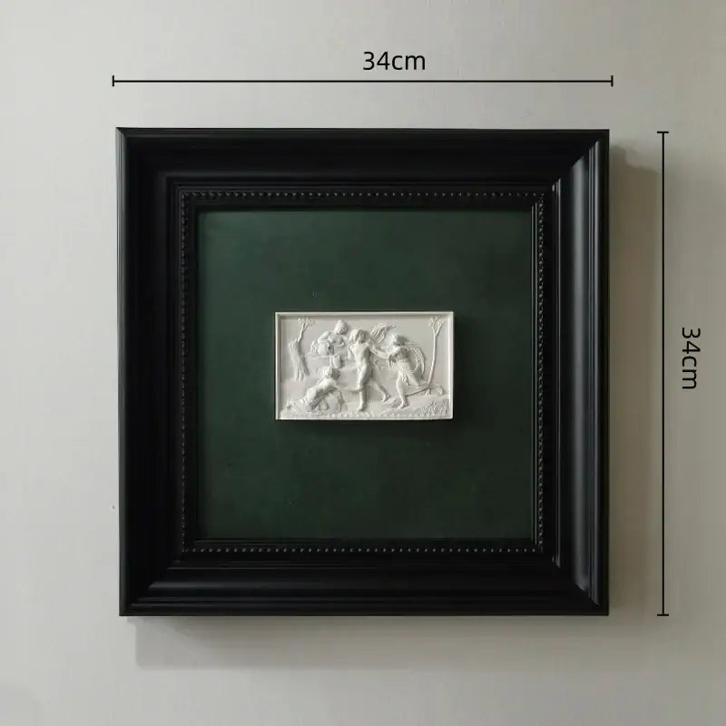White abstract figure relief sculpture decorative painting in black frame by DecorBites for wall decoration