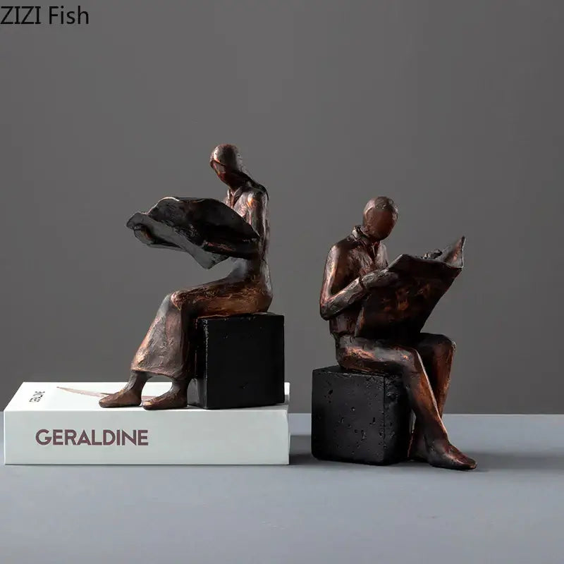 Decorbites abstract figure bronze resin sculpture bookend featuring two seated individuals reading on black cube bases