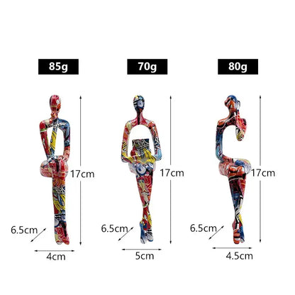 Three colorful stylized decorbites abstract figurine modern pop art sculptures with graffiti designs for home decor