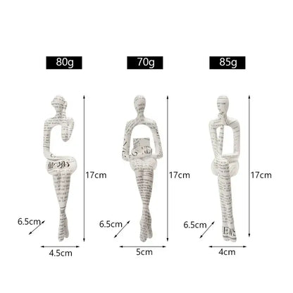 Three white paper-art decorbites abstract figurine modern sculptures made from printed newspaper for home decor display