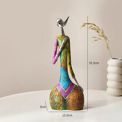 Decorbites abstract woman slender silver head sculpture with vibrant green purple blue gold fabric for living room decor