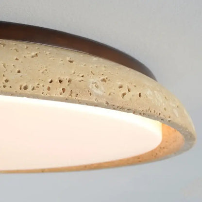 Decorbites™ acryl travertine led ceiling light with textured beige concrete ring and warm glowing white diffuser
