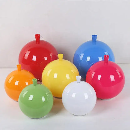 Acrylic balloon ceiling lights by DecorBites featuring glossy balloon-shaped vases in vibrant red blue yellow orange green and white