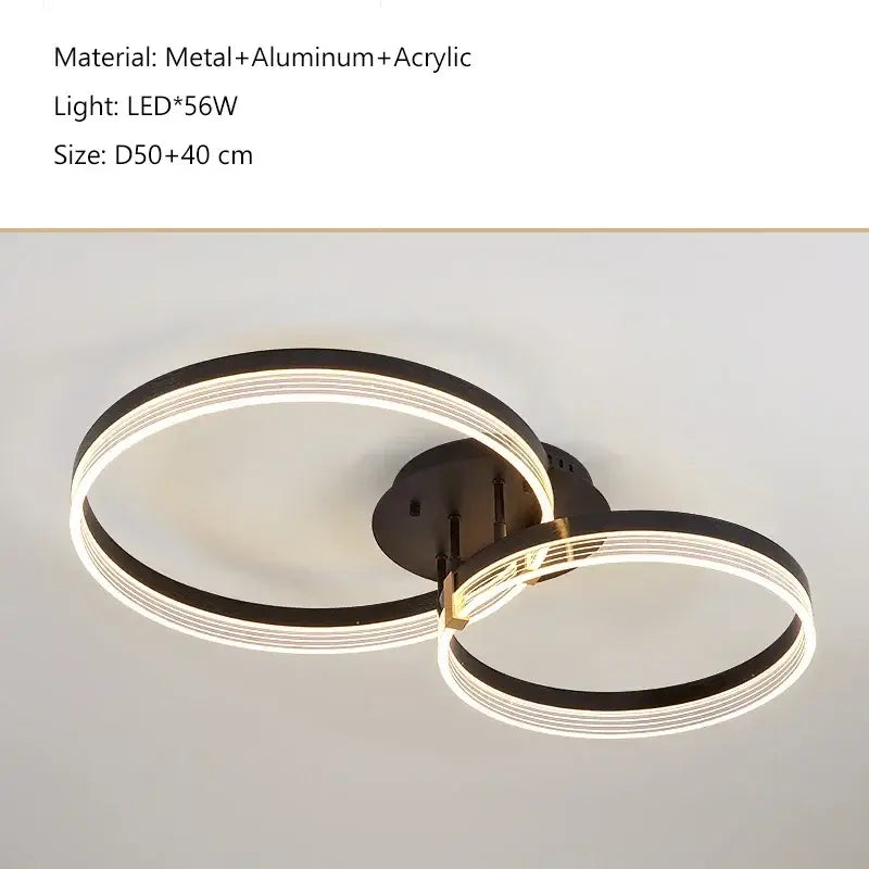 Modern black and gold acrylic ceiling chandelier lights with two interlocking circular rings for living room decor