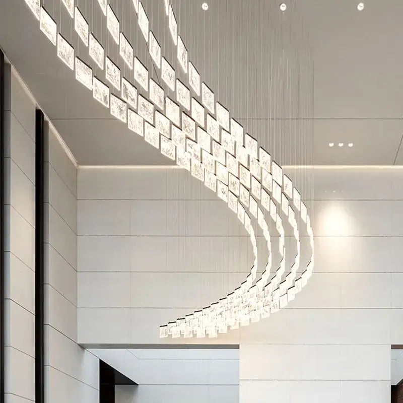 Decorbites™ acrylic chandelier lights feature a modern curved design with translucent square acrylic panels for home lighting
