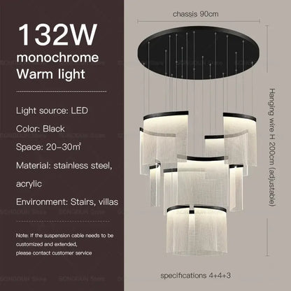 Black DecorBites™ acrylic chandelier with tiered stainless steel rings emitting warm led light for modern nordic style lighting