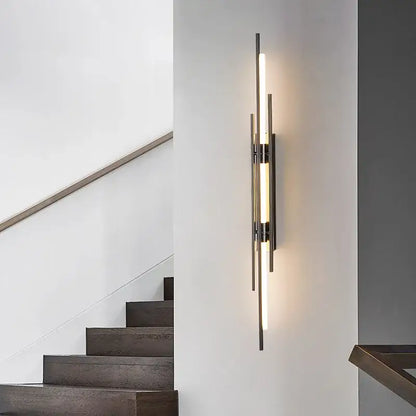 Decorbites™ acrylic copper wall sconce with vertical brushed metal rods and warm led light tubes for minimalist living rooms