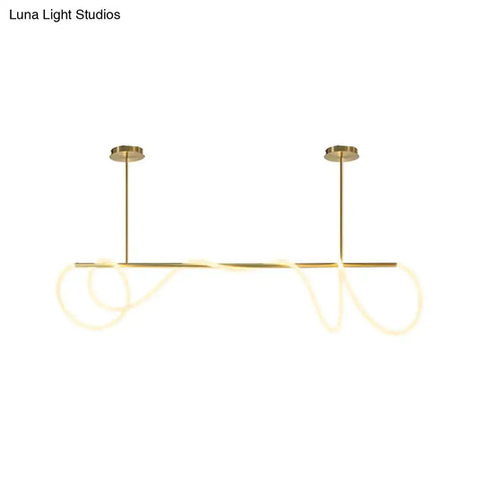 Gold-toned DecorBites acrylic flex tube suspension light with sleek LED rods providing natural ceiling light