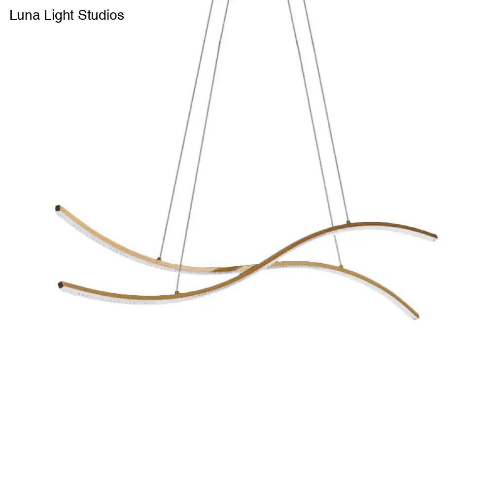 Modern gold-toned linear island pendant with acrylic curved arms minimalist design warm white led chandelier lighting