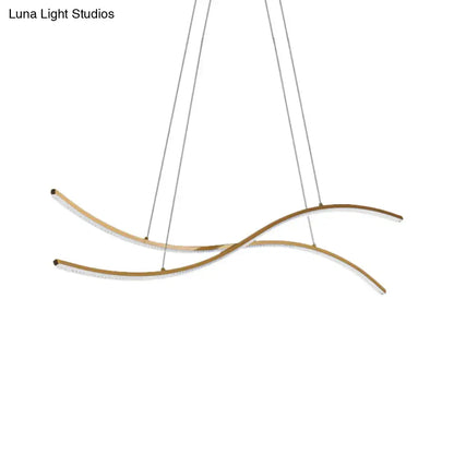 Modern gold-toned linear island pendant with acrylic curved arms minimalist design warm white led chandelier lighting