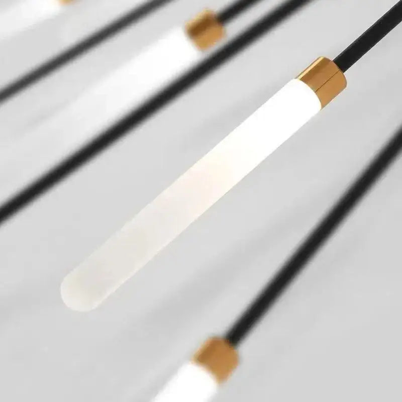 Modern minimalist decorbites acrylic sunflower ceiling lamp with frosted glass tubes and gold-toned metal caps for living room
