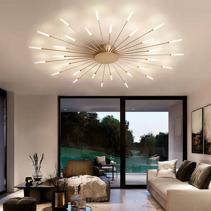 Modern gold-toned decorbites acrylic sunflower ceiling lamp with central base and radiating led rods for living room