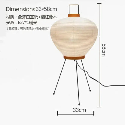 Beige rice paper table lamp with wooden top and base on black metal legs decorbites™ akari noguchi table lamp