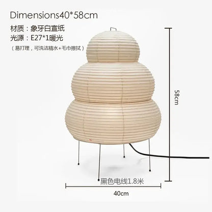 Beige paper lantern led floor lamp with tiered segmented design and black metal legs for living room decor by decorbites akari noguchi