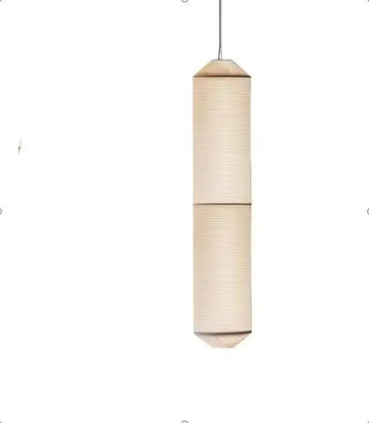 Minimalist beige akari rice paper pendant lamp with cylindrical shape and subtle ridges for living room or bedroom