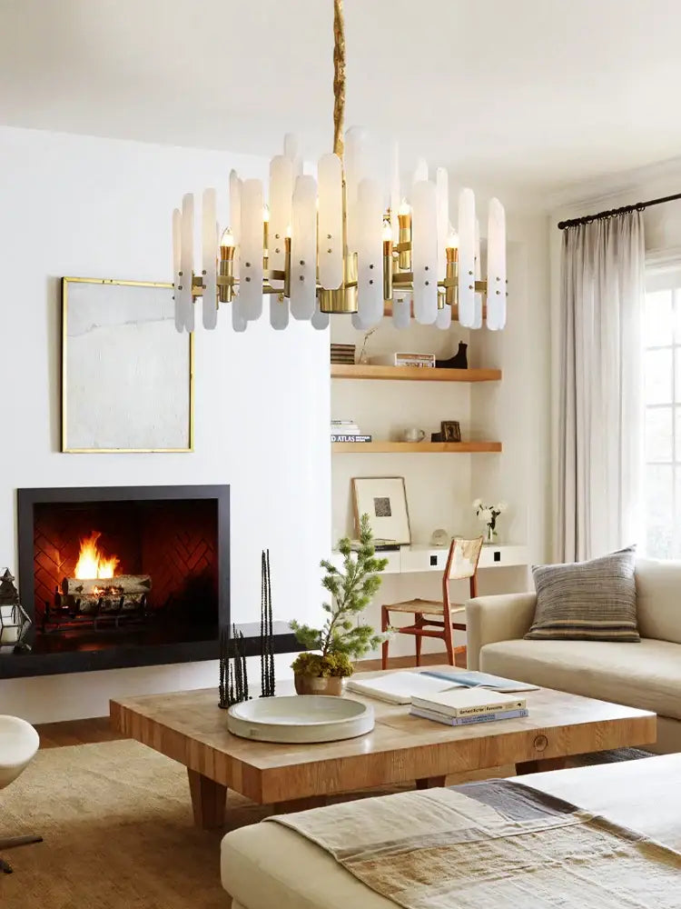 A modern alabaster gold chrome chandelier with frosted glass tubes and brass accents for living room suspension