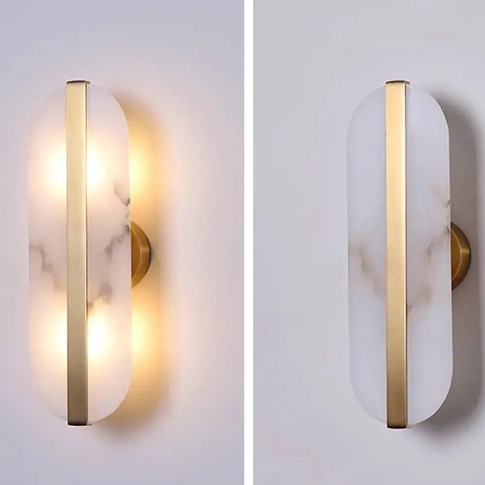 Modern wall lamp with alabaster moon oval marble diffuser and polished brass accents for elegant indoor decor