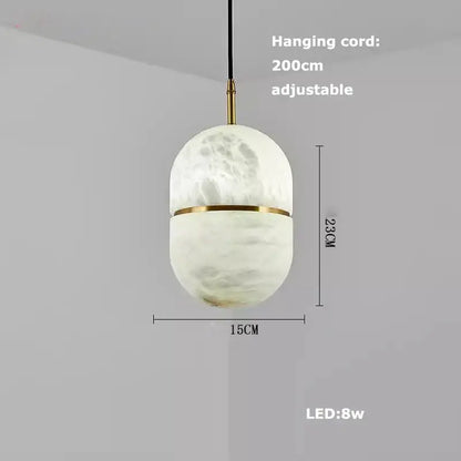 Decorbites™ alabaster pendant lights with frosted white marble-textured glass globe and gold metal accents for living room