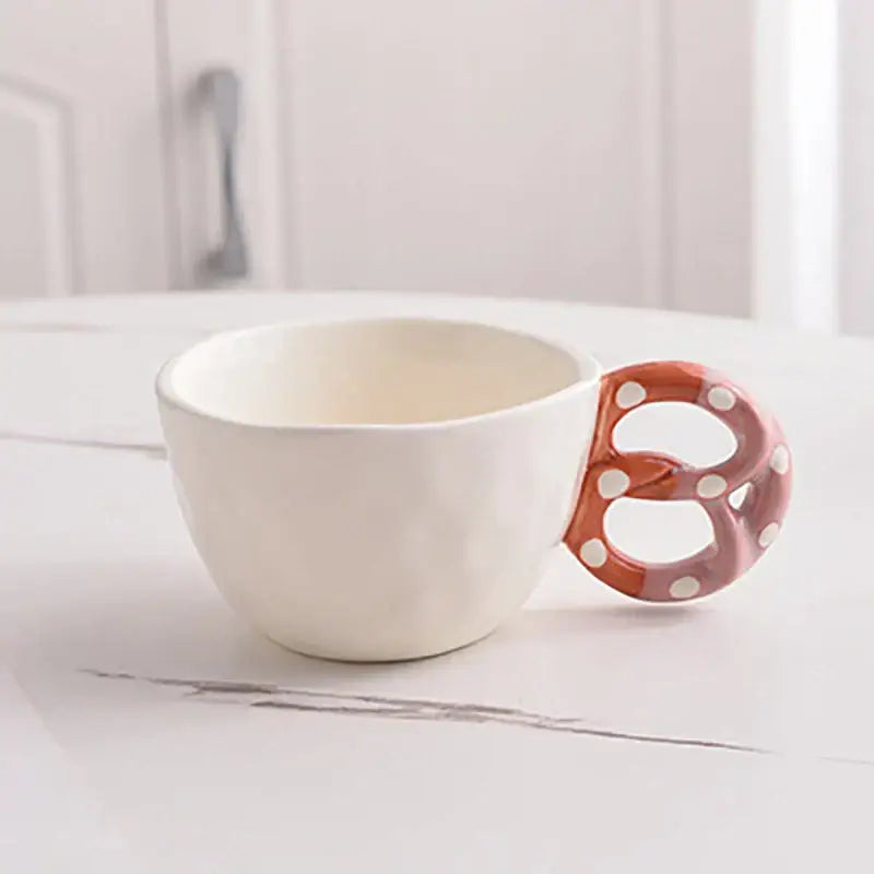 Decorbites alkali water biscuit mug ceramic teacup with white body and reddish-brown pretzel-shaped polka dot handle